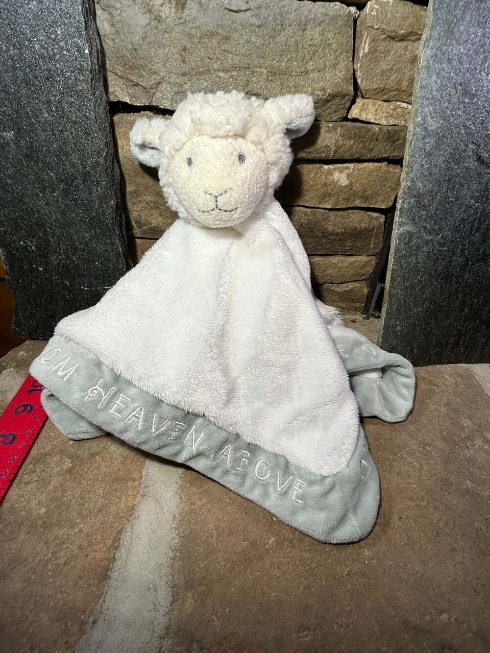 Grasslands Road white lamb sheep lovey with writing on edges